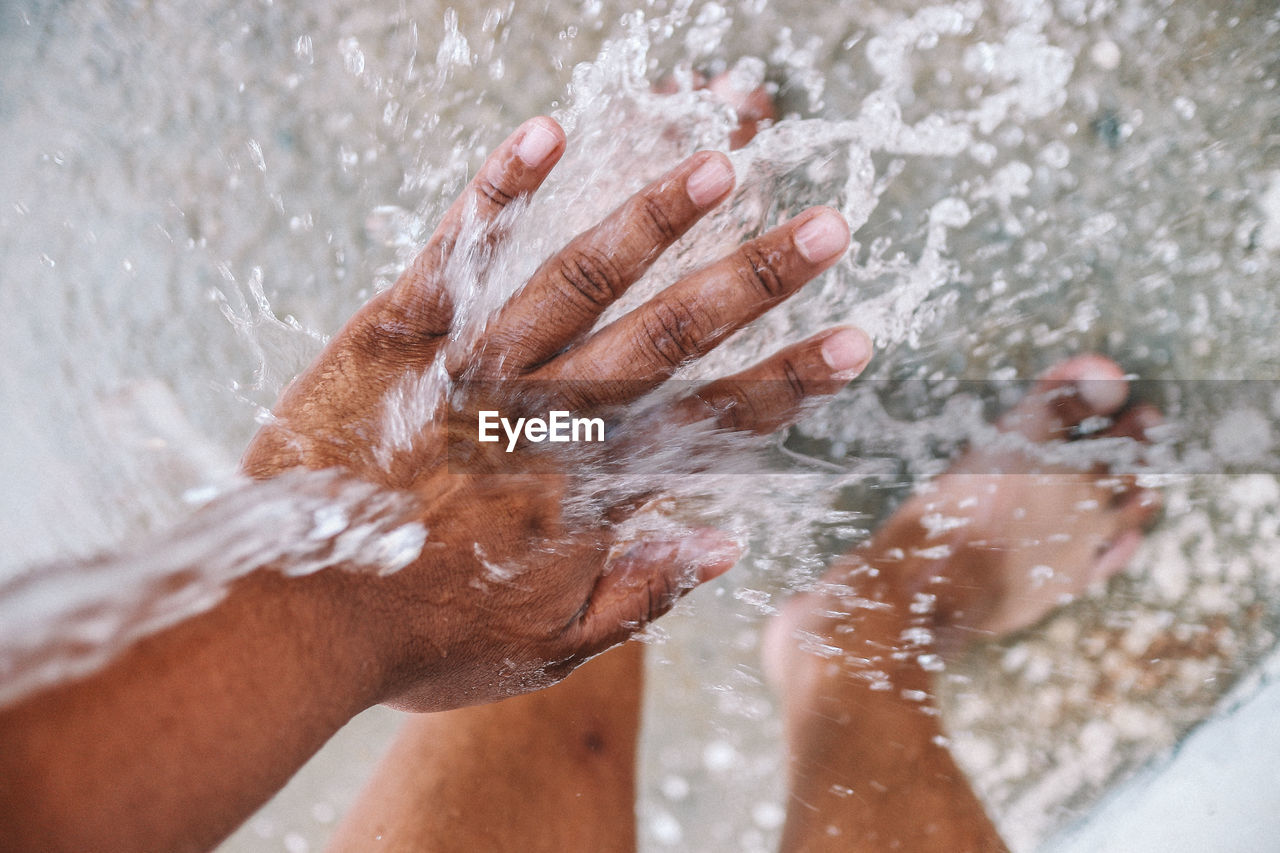 Low section of person in water
