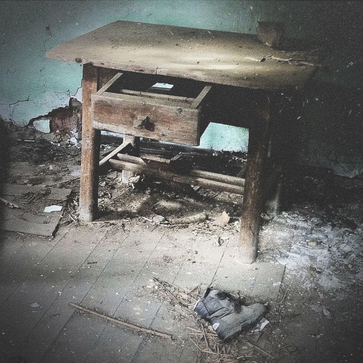 Wooden table in an abandoned room