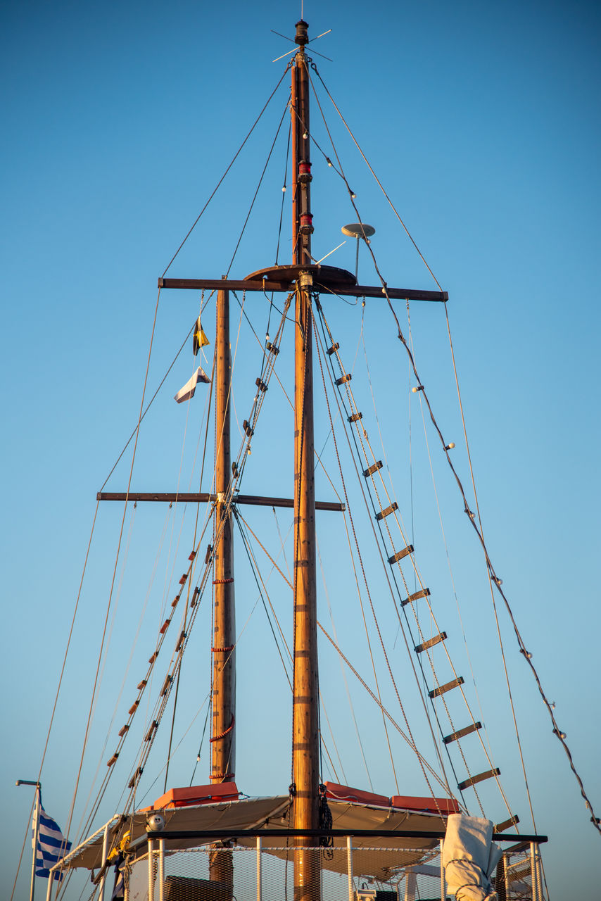 sailboat, nautical vessel, transportation, vehicle, ship, sailing ship, sky, tall ship, sailing, mode of transportation, architecture, mast, water, blue, pole, sea, galleon, nature, no people, clear sky, harbor, outdoors, history, watercraft, the past, day, boat, windjammer, schooner, built structure, sunny, pier, passenger ship, rigging, travel