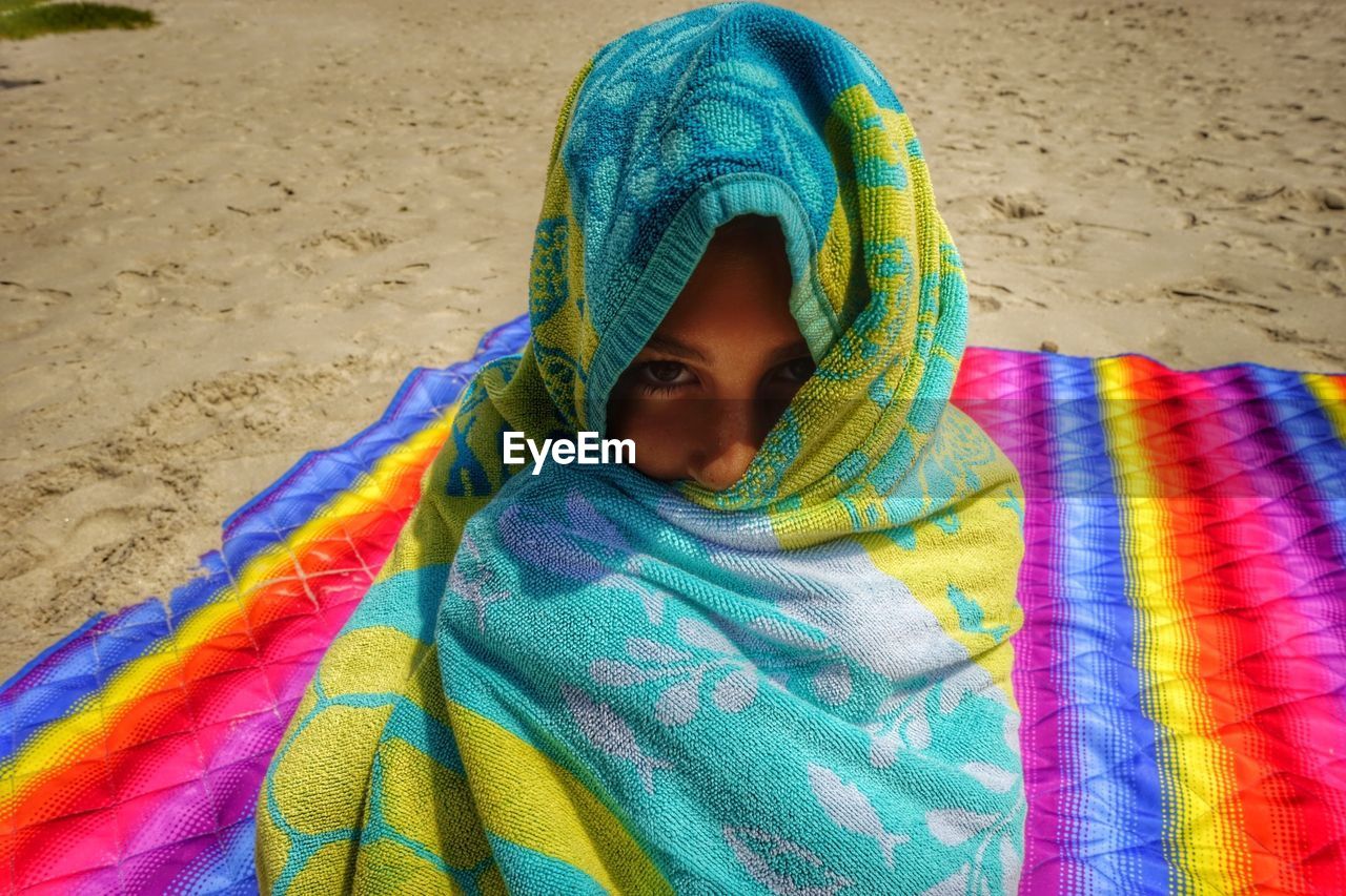 Portrait of girl wrapped in towel