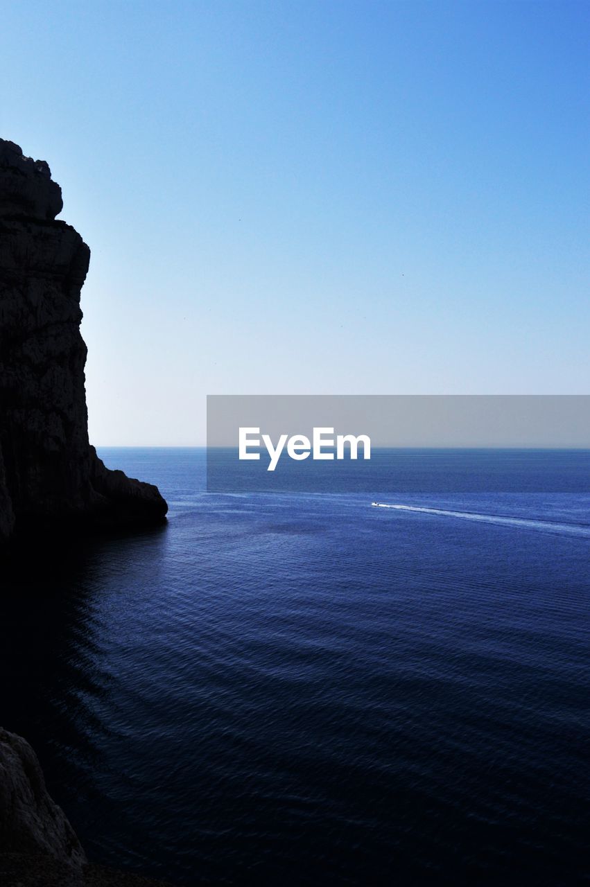 SCENIC VIEW OF SEA AGAINST BLUE SKY