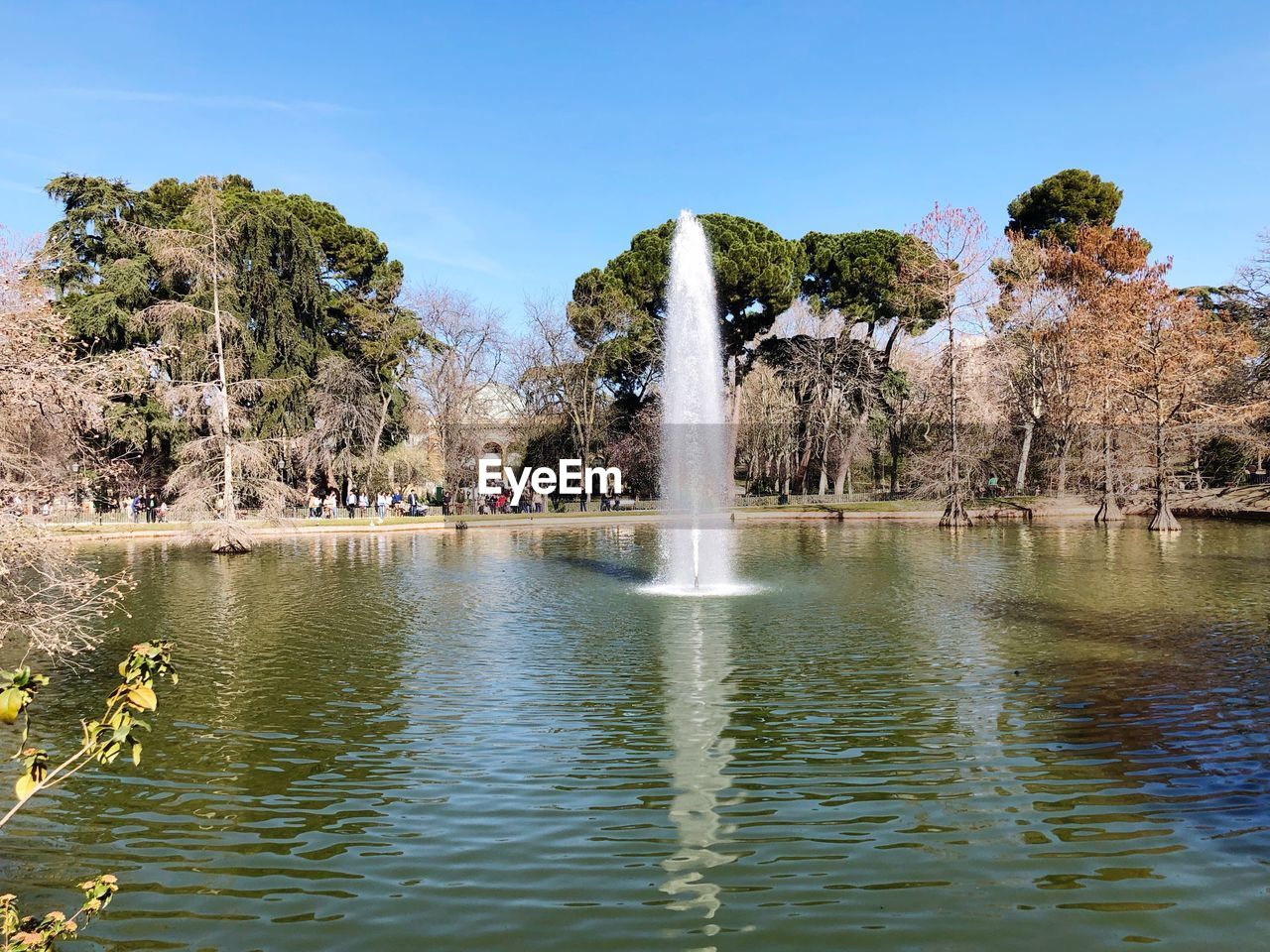 FOUNTAIN IN LAKE AGAINST SKY