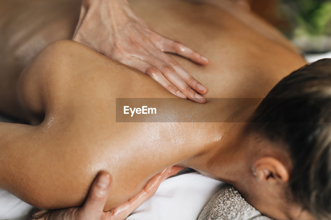 Ayurveda beck and shoulder blade massage with ayurvedic oil
