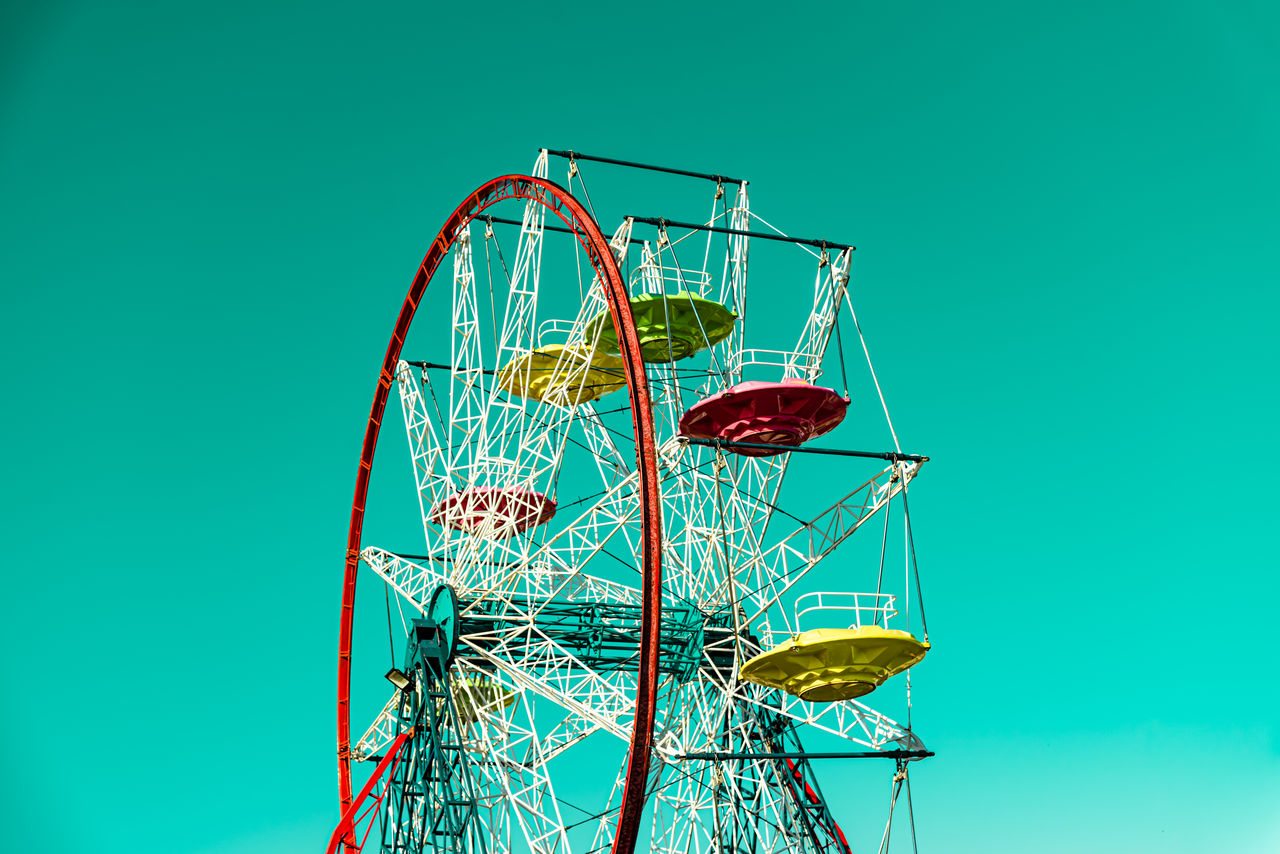 Low angle view of ferris wheel in the amusement park