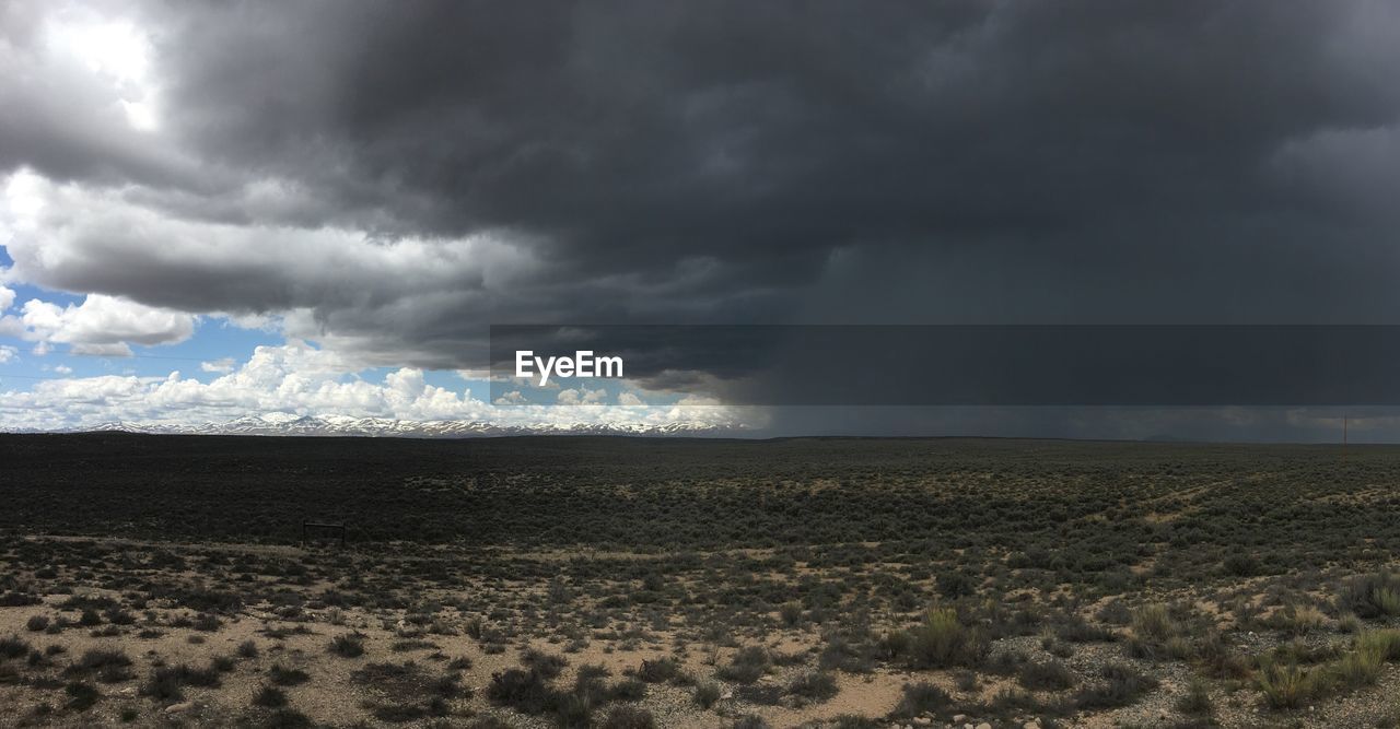 Storm clouds over landscape