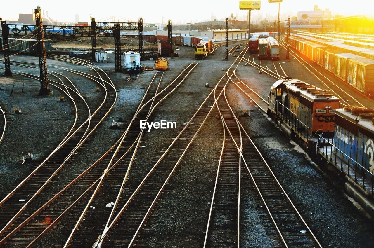 High angle view of trains on railroad tracks during sunset