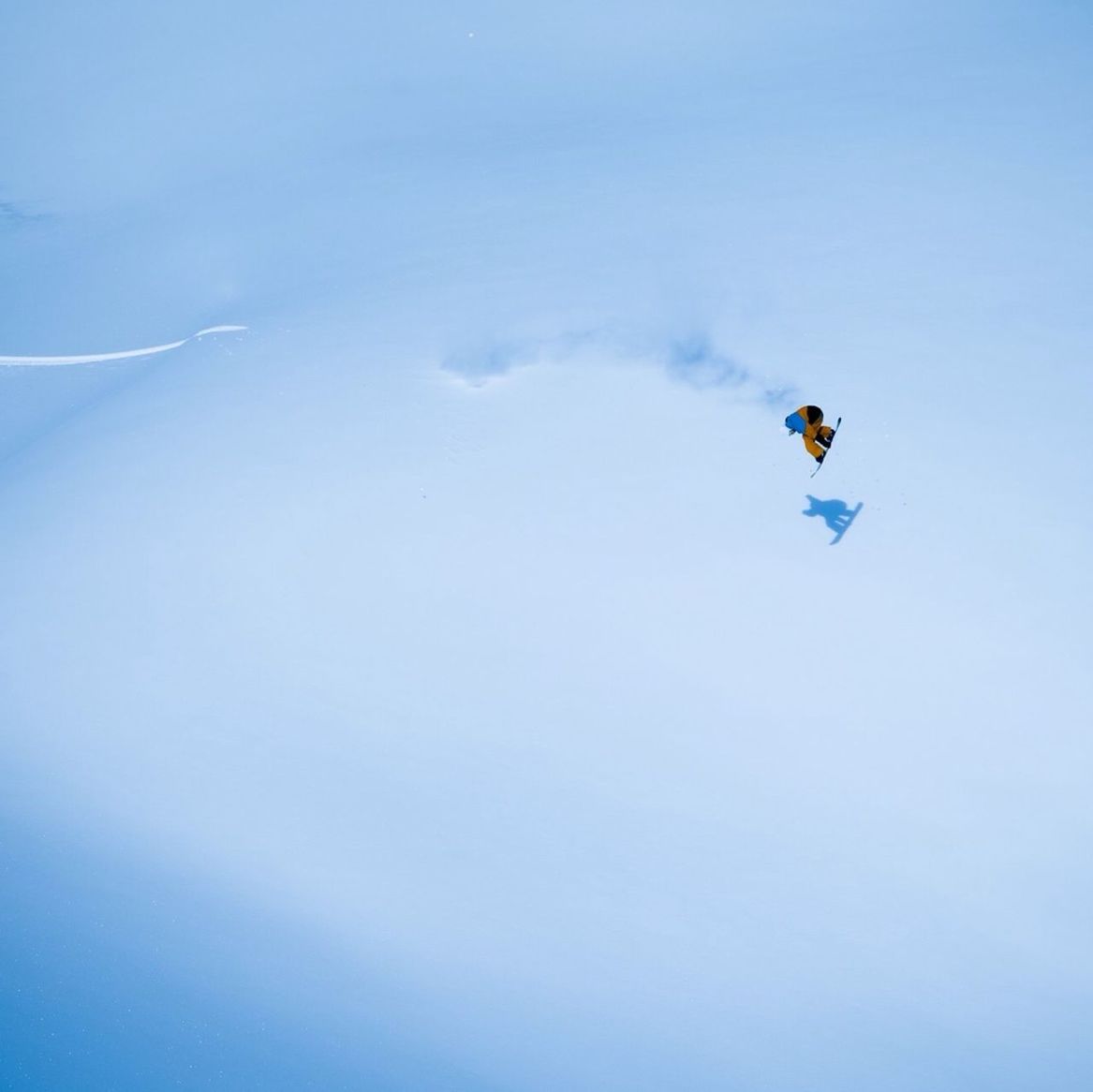 Aerial view of person snowboarding