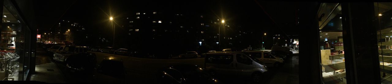 VIEW OF ILLUMINATED STREET LIGHTS IN CITY