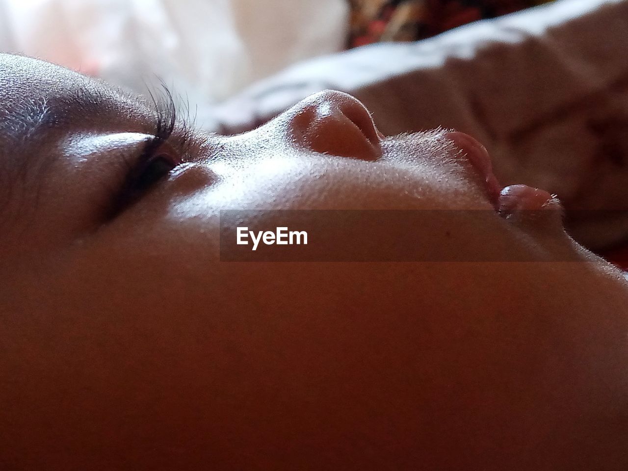 close-up, relaxation, skin, adult, one person, lying down, human face, nose, women, indoors, eyes closed, human skin, human mouth, lifestyles, wellbeing, body care, human head, health spa, young adult, spa treatment, resting, beauty spa, healthcare and medicine, portrait, skin care, female, beauty treatment, comfortable, sleeping, limb