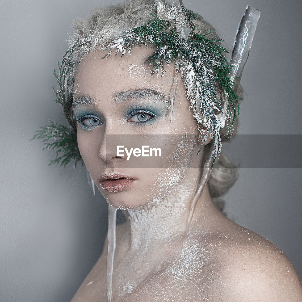 Close-up portrait of young woman with make-up