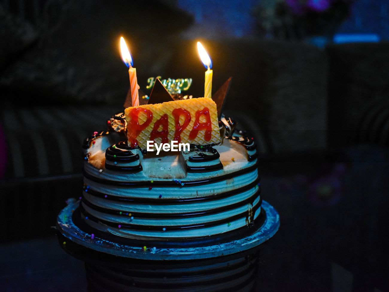 Burning Candles On Birthday Cake At Home Id 126042422