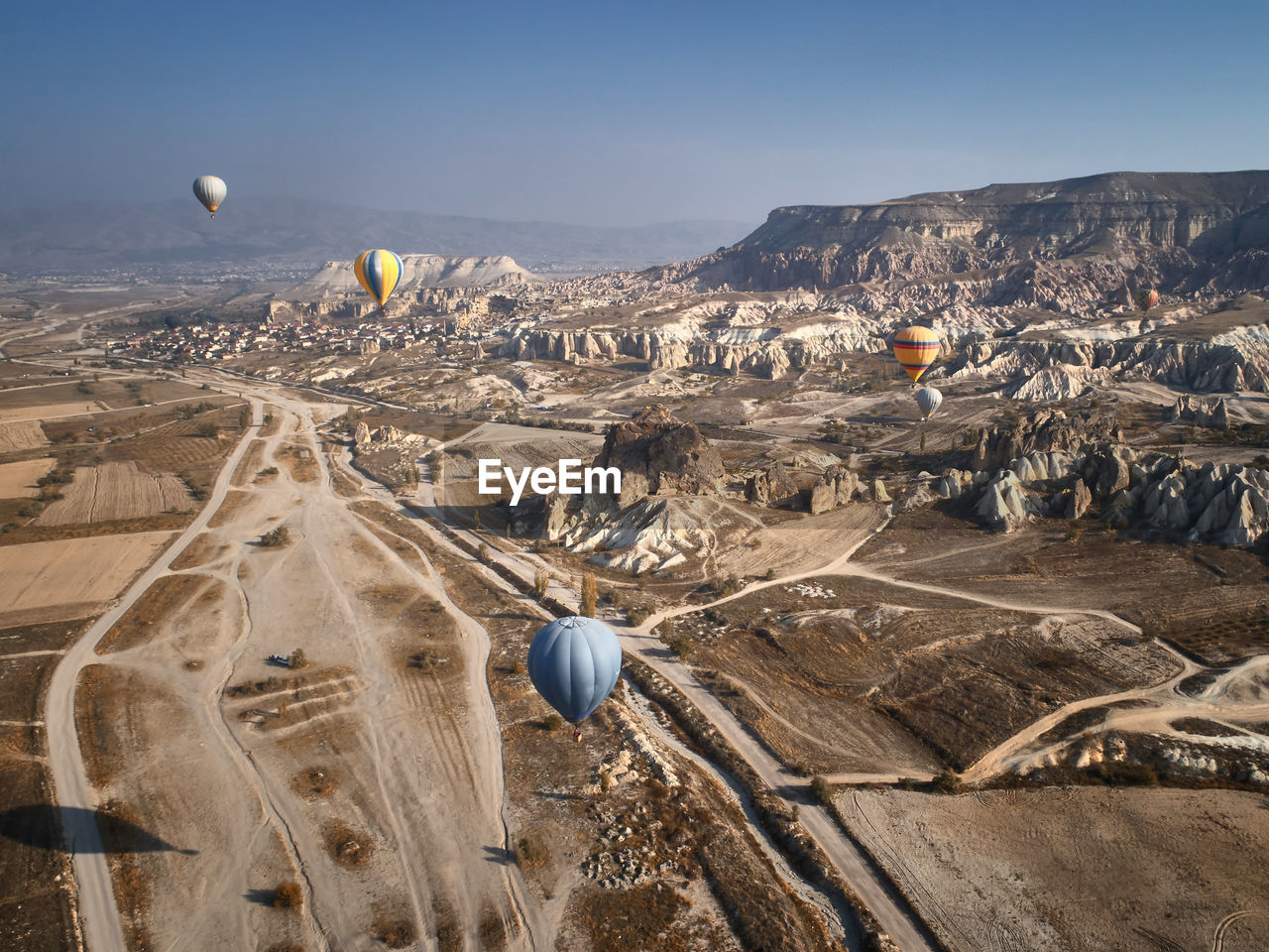 Colorful hot air balloons at goreme national park, cappadocia, turkey. aerial view