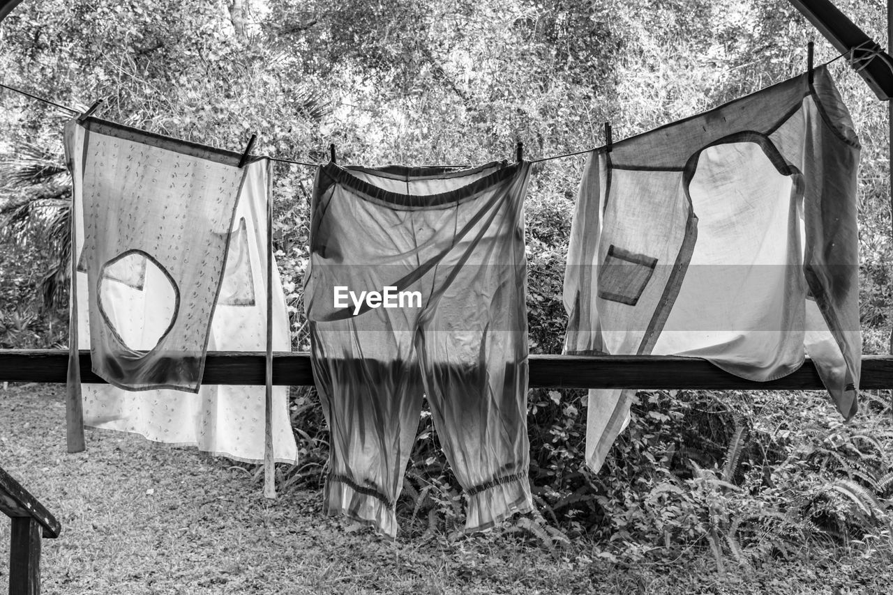 ROW OF CLOTHES DRYING ON CLOTHESLINE