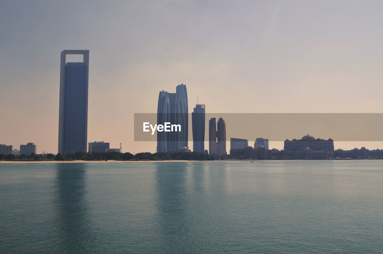 Modern buildings in city against sky