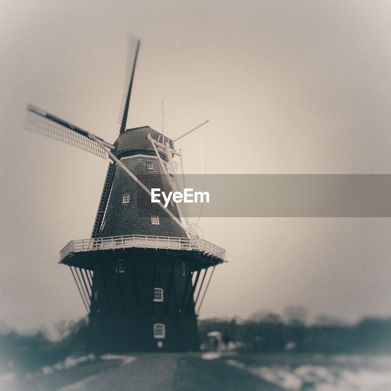 Traditional windmill against clear sky
