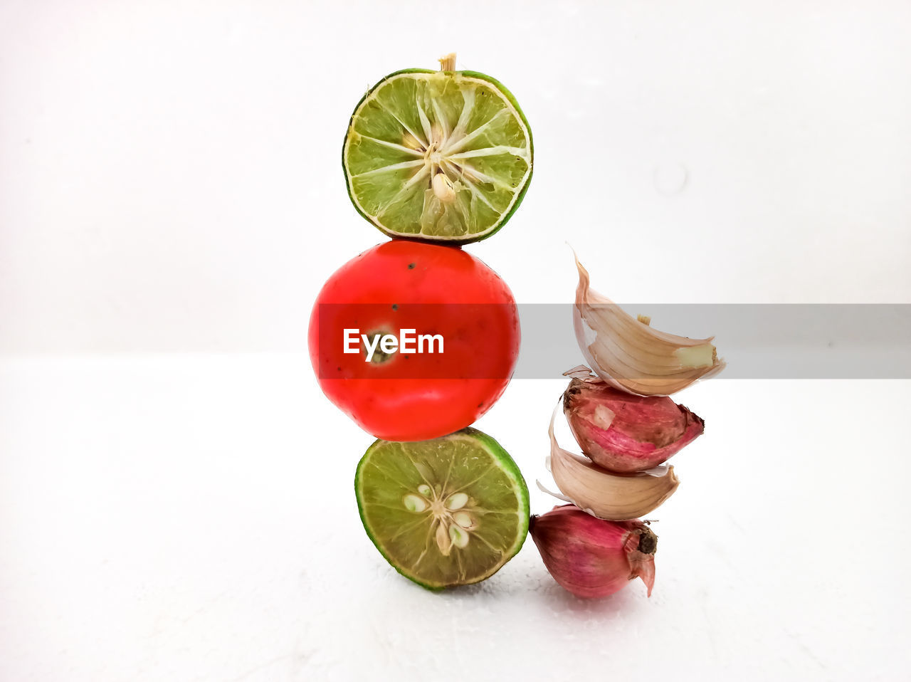 HIGH ANGLE VIEW OF FRUITS ON WHITE BACKGROUND