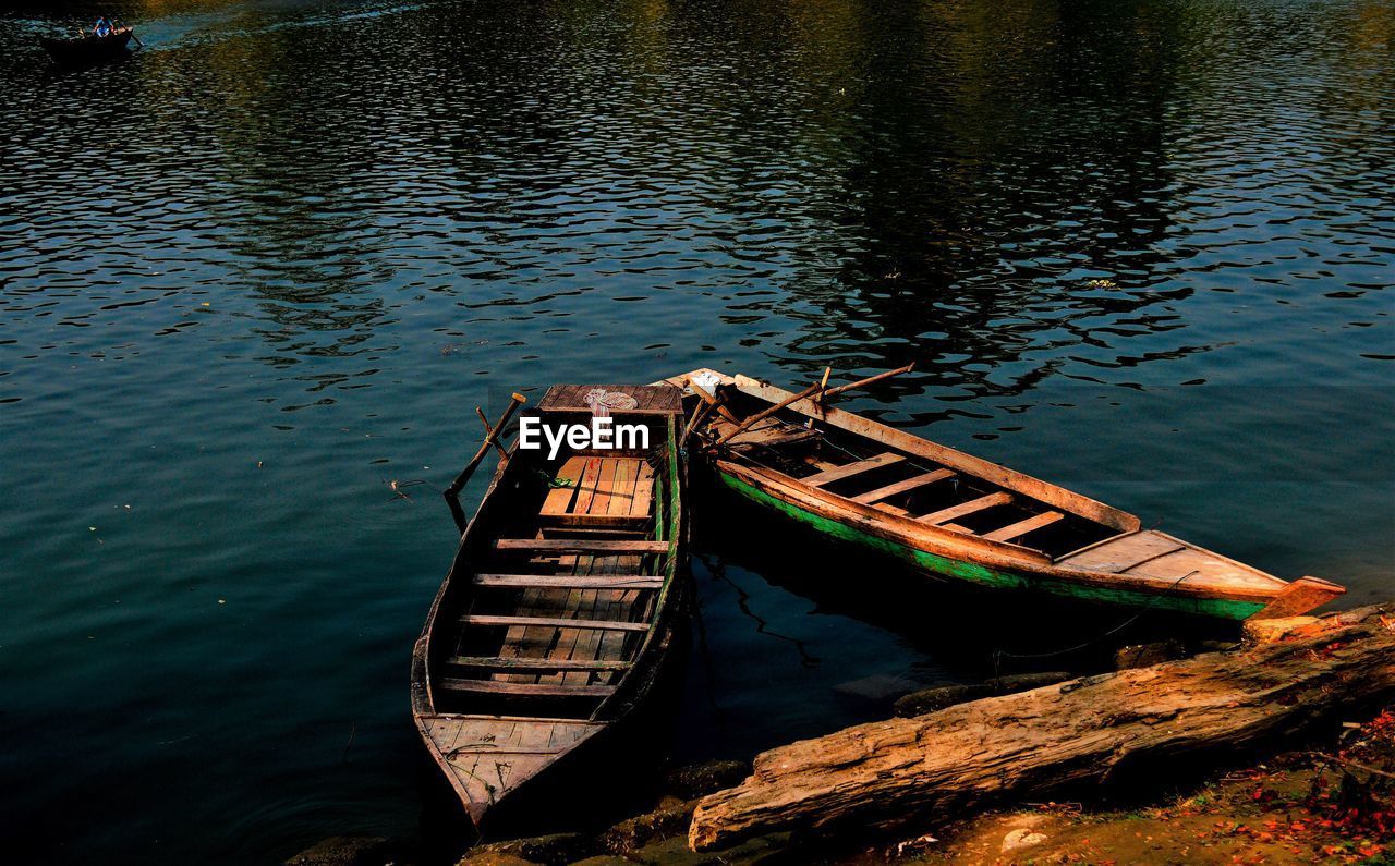 High angle view of abandoned fishing boats moored on lake
