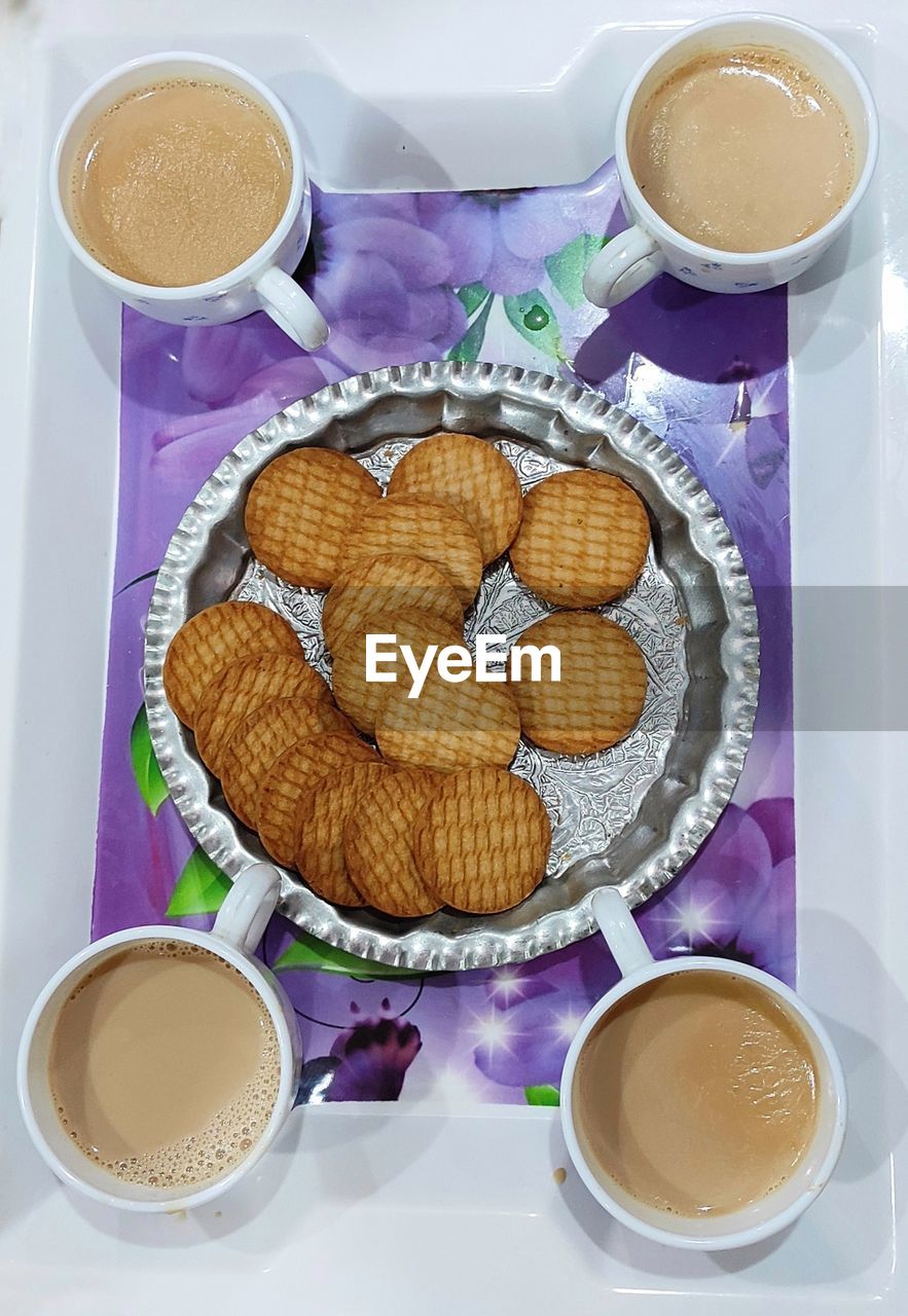 HIGH ANGLE VIEW OF COFFEE AND COOKIES ON TABLE