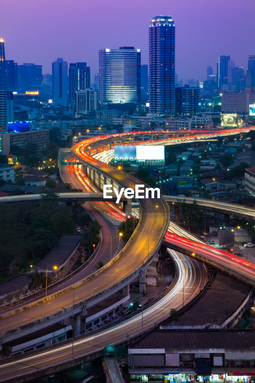 HIGH ANGLE VIEW OF ELEVATED ROAD AT NIGHT