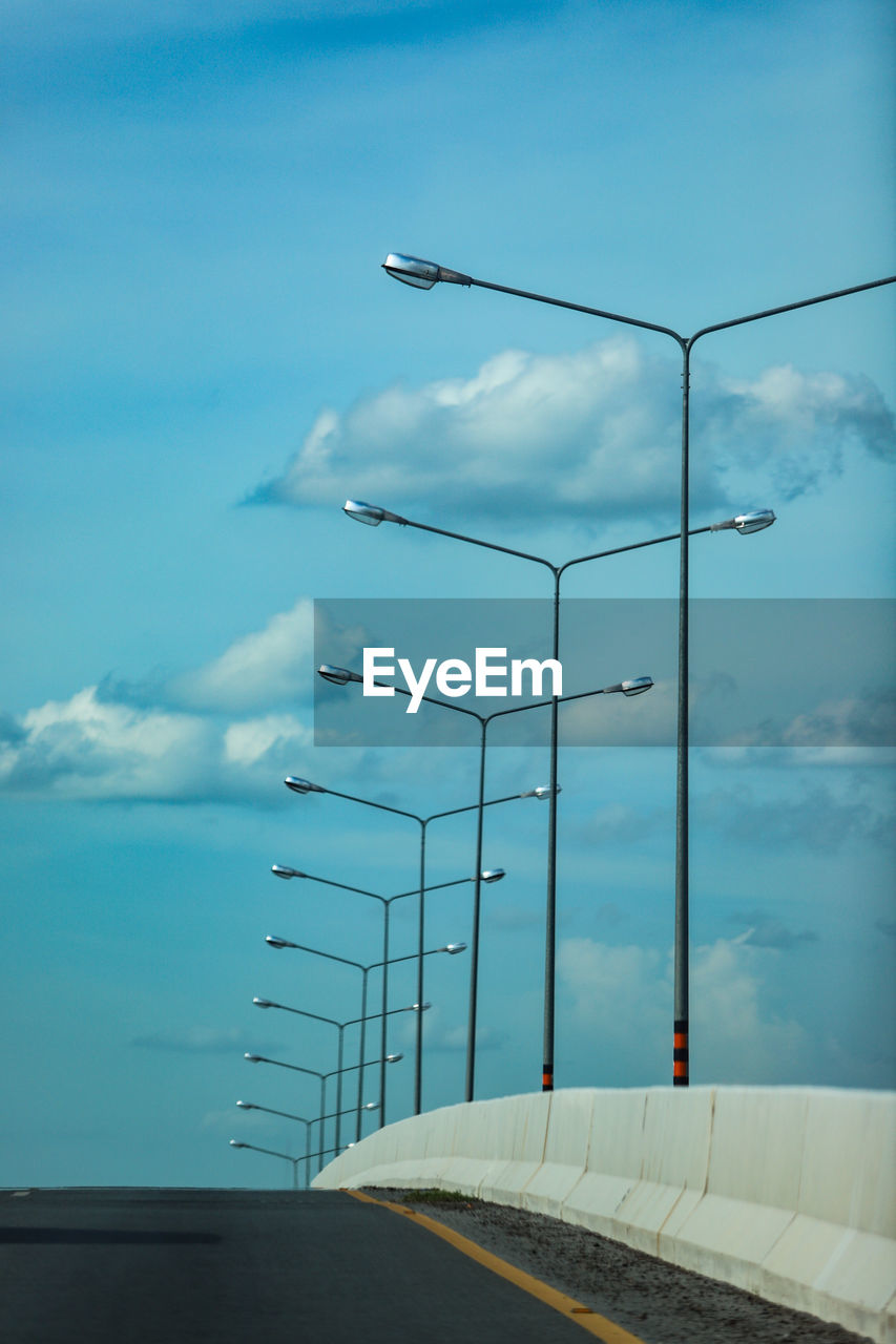 Low angle view of street light against sky