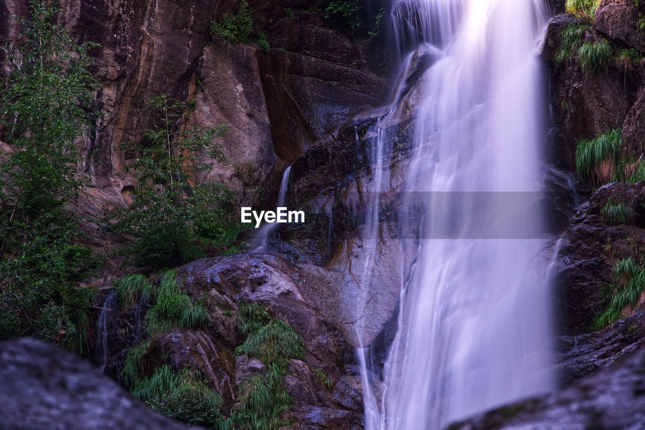 waterfall, beauty in nature, scenics - nature, water, forest, land, nature, plant, tree, long exposure, environment, motion, rock, body of water, water feature, flowing water, stream, no people, blurred motion, watercourse, outdoors, non-urban scene, travel destinations, landscape, river, flowing, travel, tourism, power in nature, idyllic, rainforest, autumn, moss, falling, speed, holiday, rock formation