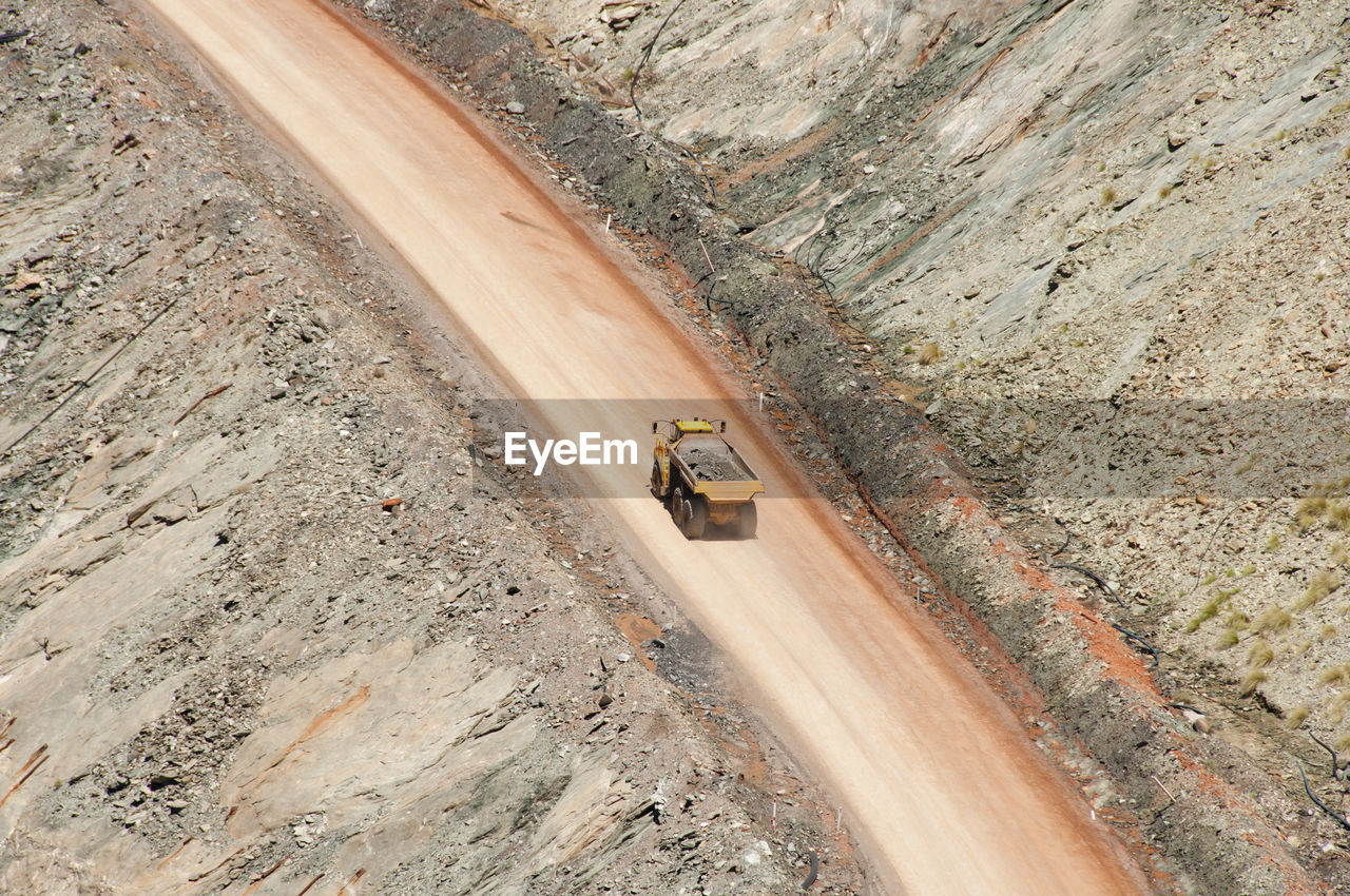 High angle view of truck on dirt road