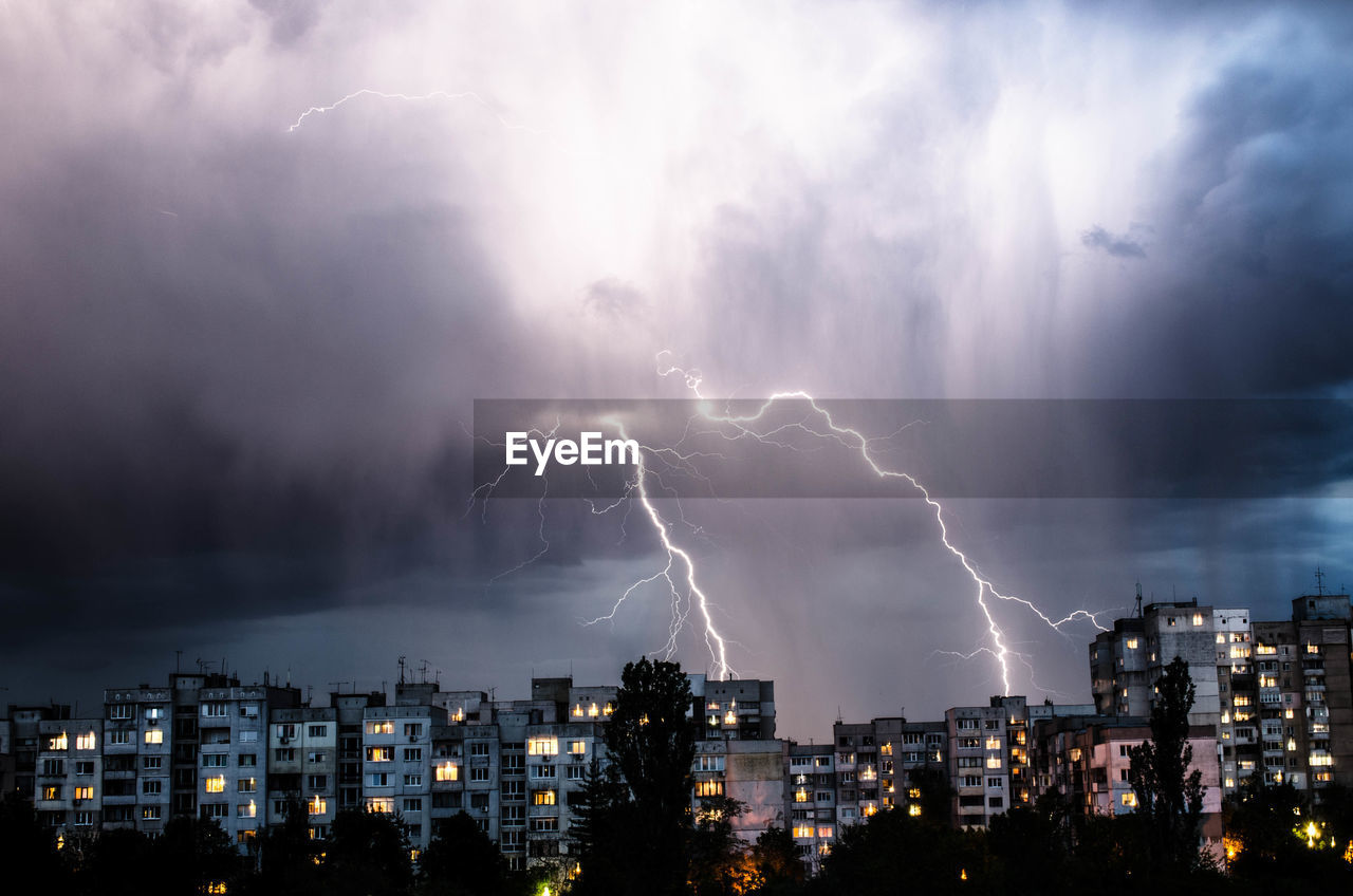 Lightning in sky over city