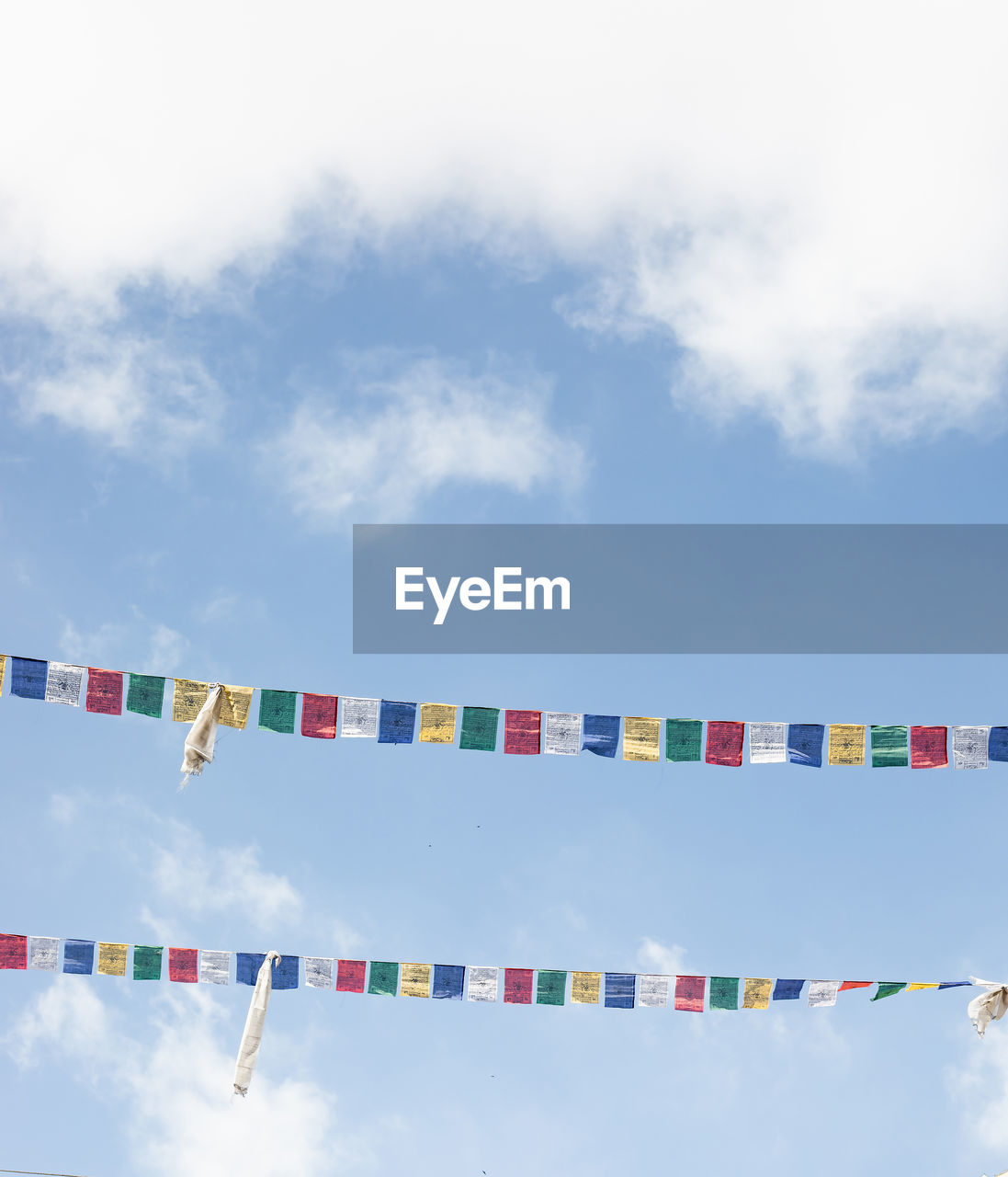 Low angle view of prayer flags against sky
