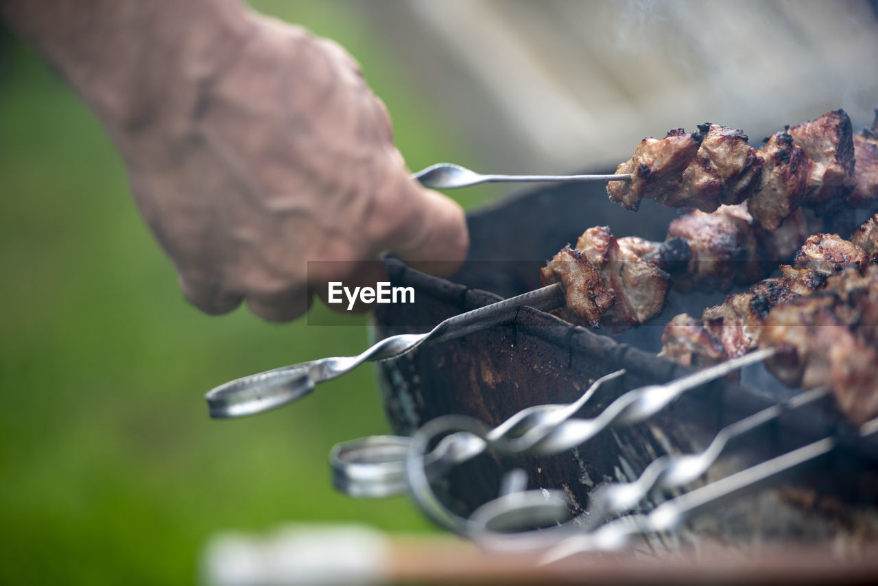 close-up of meat on barbecue