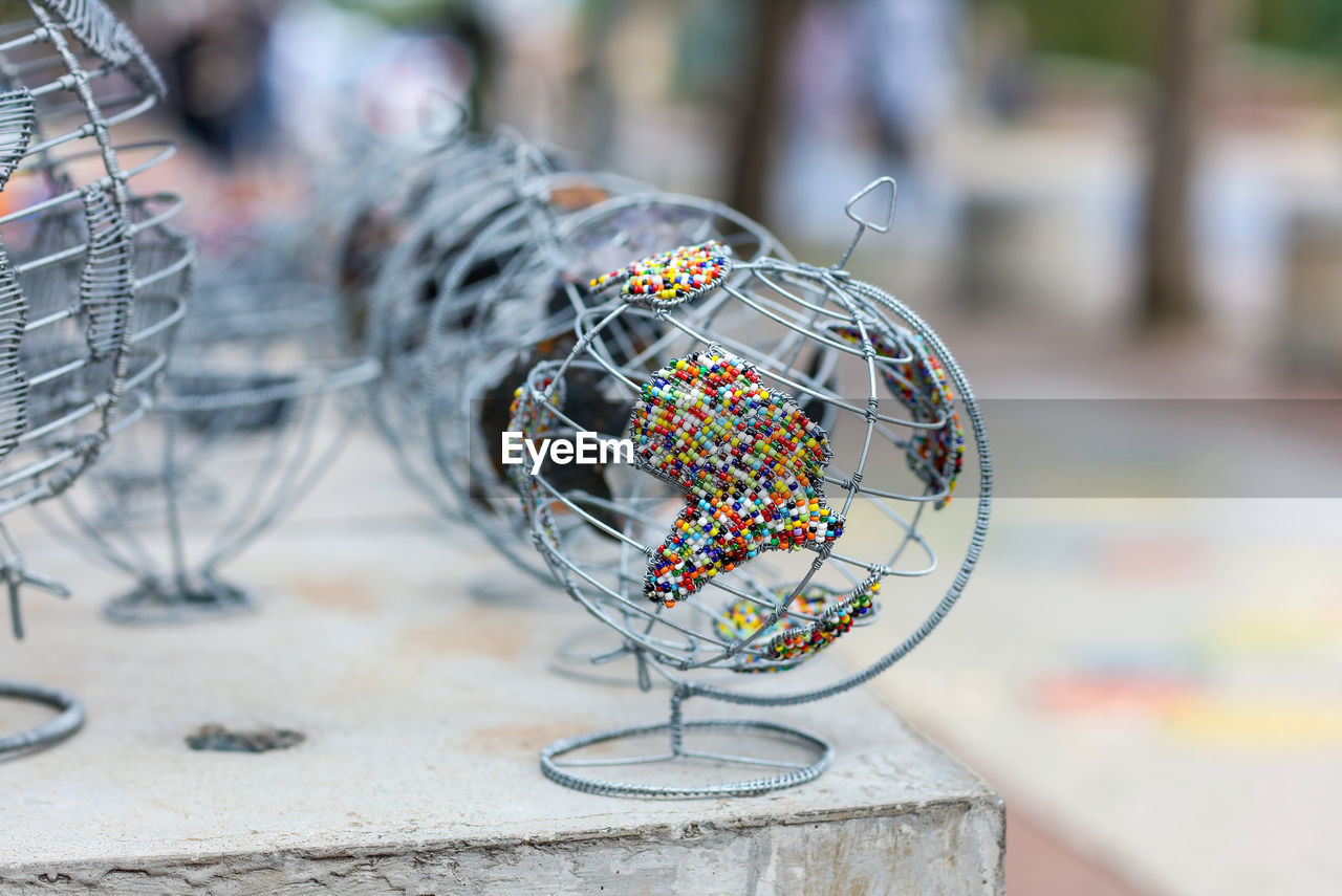 Close-up of metallic globe on table