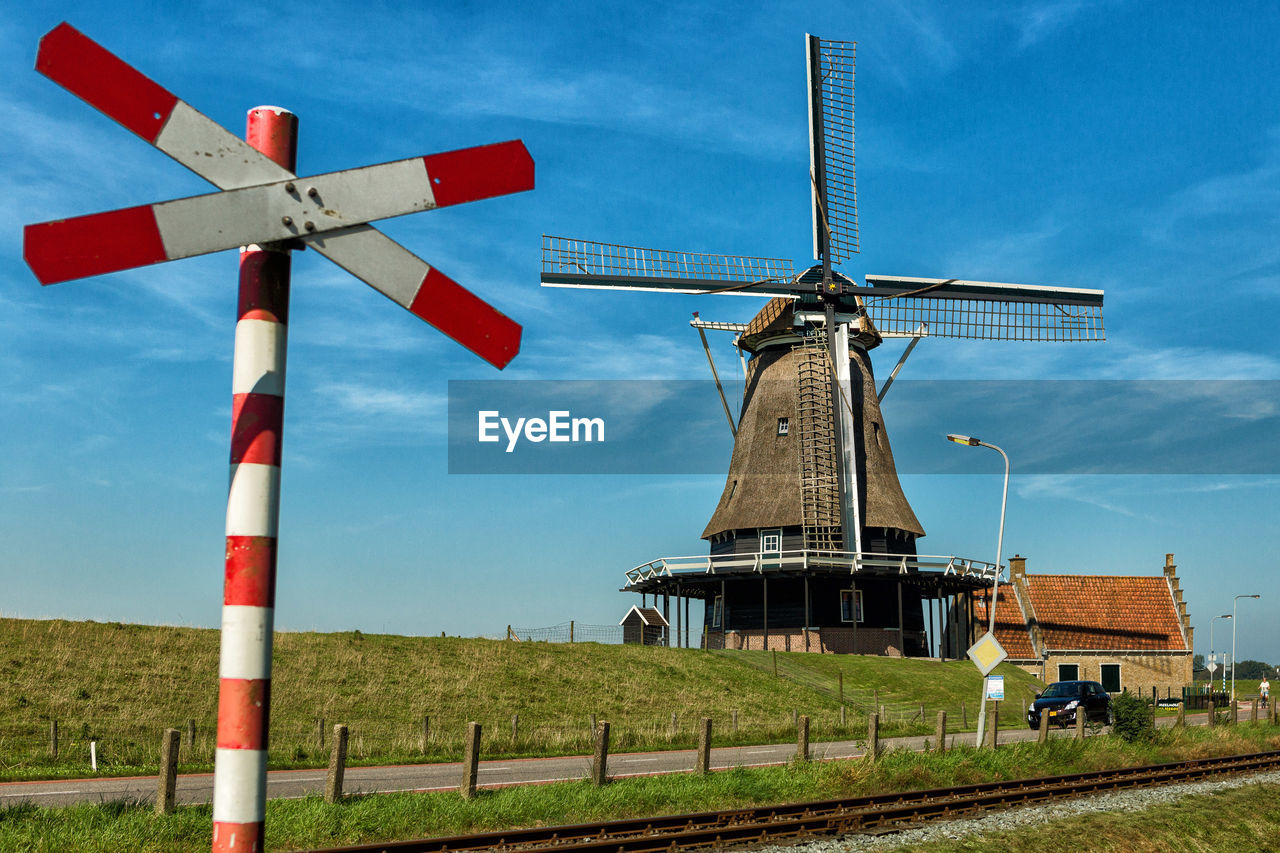 Two crosses - windmill and level crossing