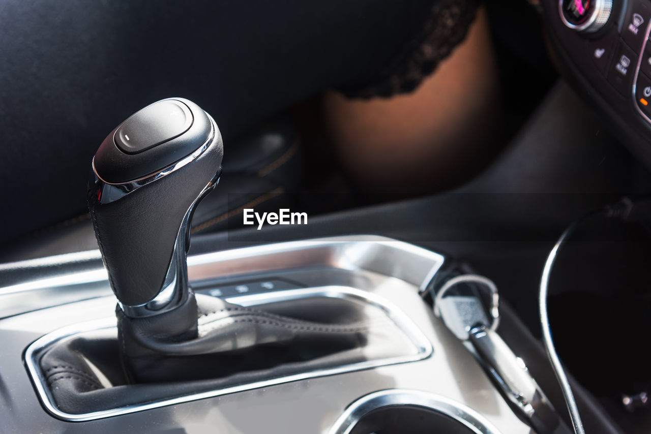 Close-up of gear shift in car