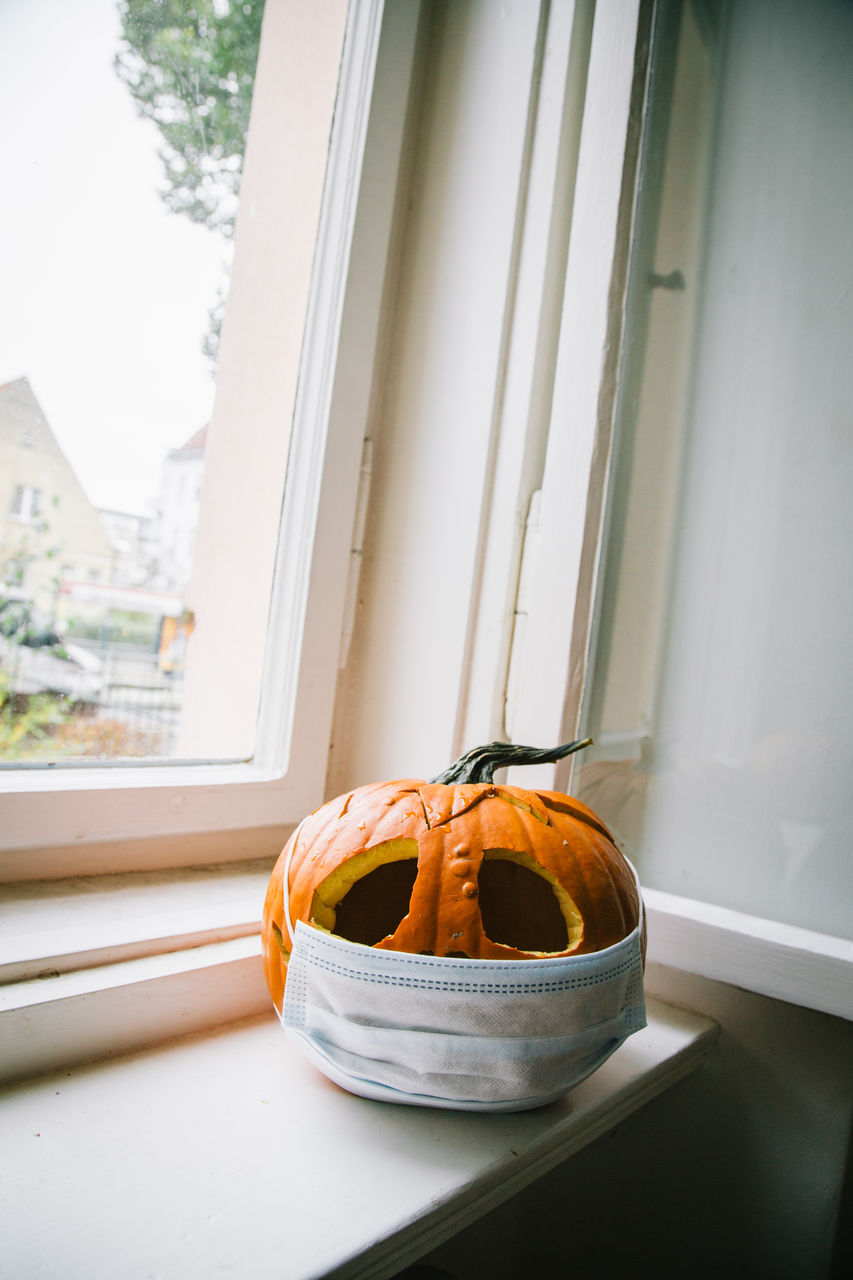 Close up of jack o lantern halloween pumpkin with face mask