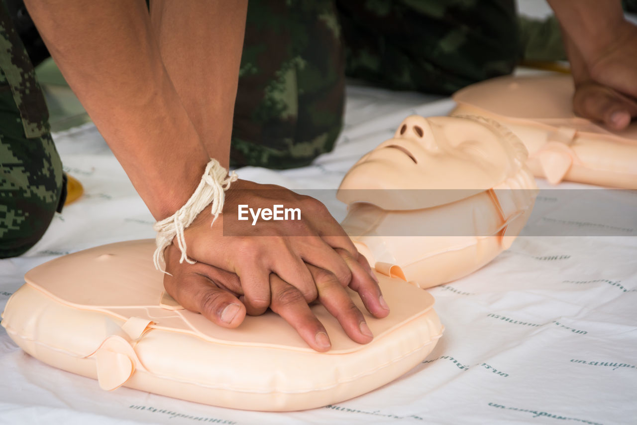 Chest compressions on cpr dummy