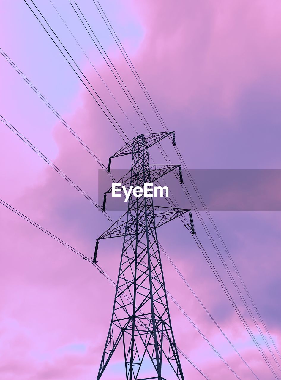LOW ANGLE VIEW OF SILHOUETTE ELECTRICITY PYLONS AGAINST SKY DURING SUNSET