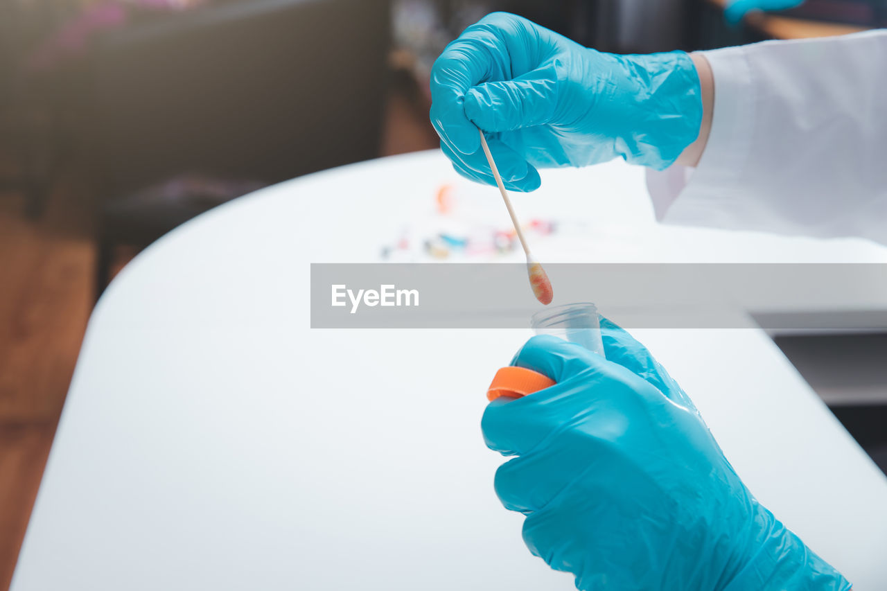 Close-up of person holding medicine