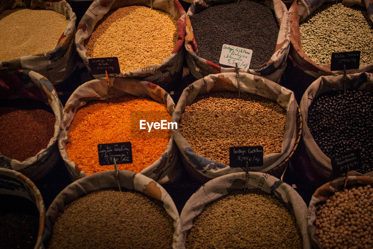 Full frame shot of spices and dries beans for sale at market stall