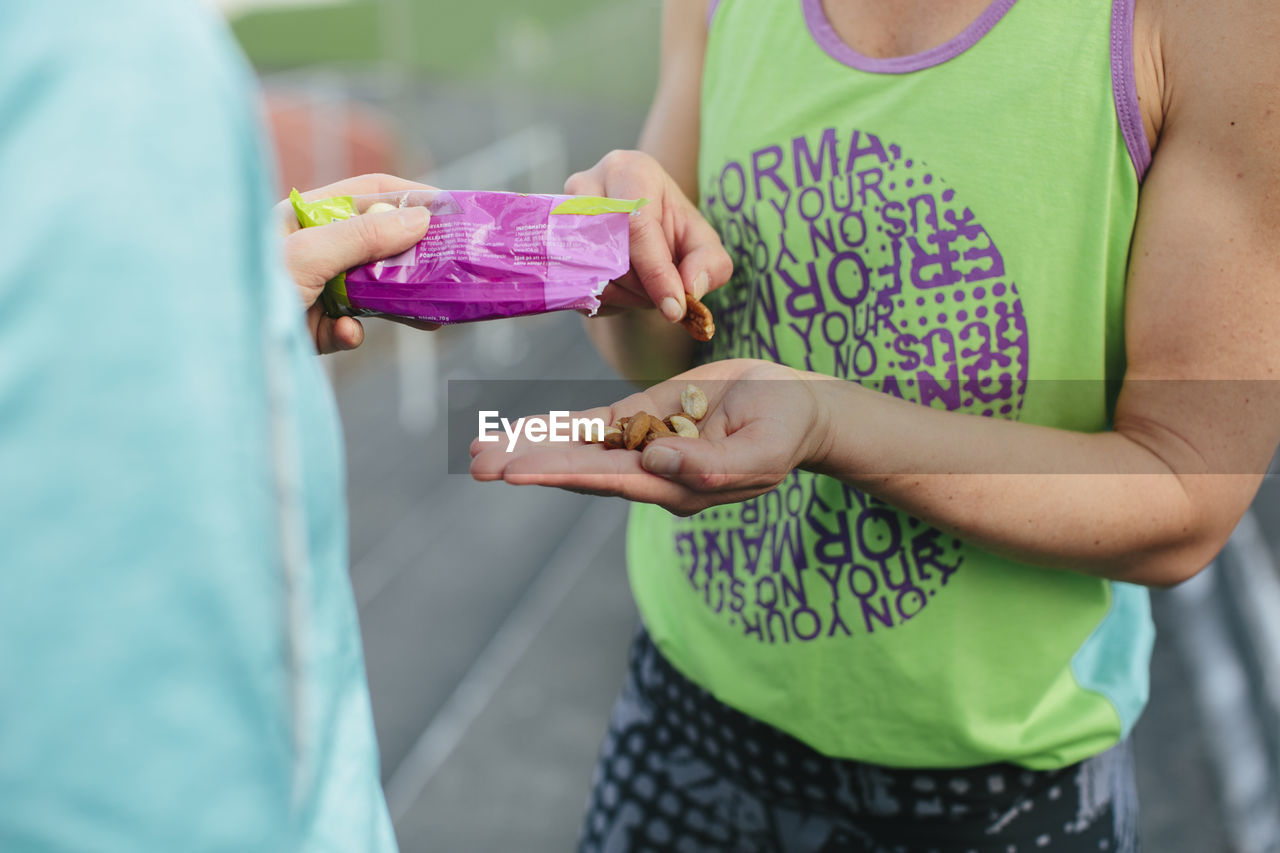 Friends sharing snacks