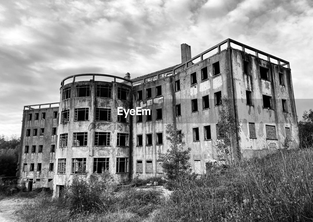 Low angle view of old building against sky