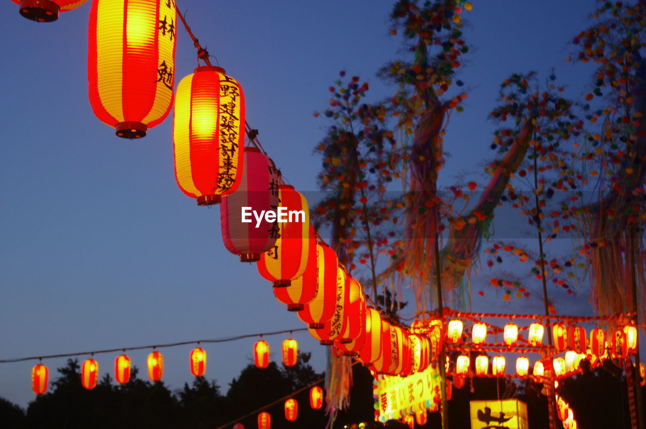 Low angle view of illuminated japanese lanterns