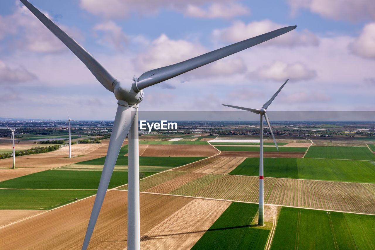 VIEW OF WIND TURBINES ON LAND