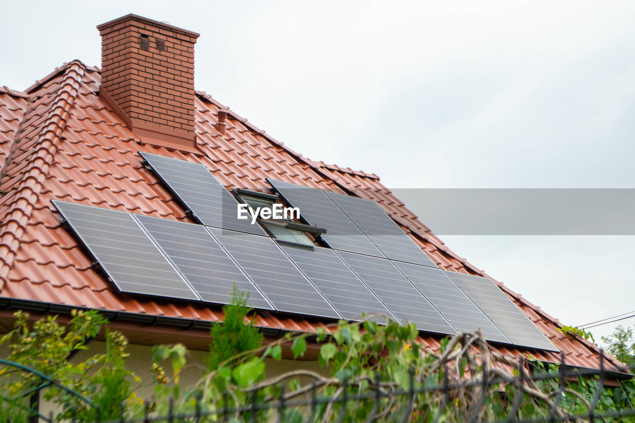 House roof with photovoltaic modules.