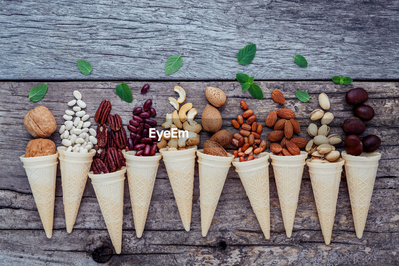 Directly above shot of nuts in ice cream cones