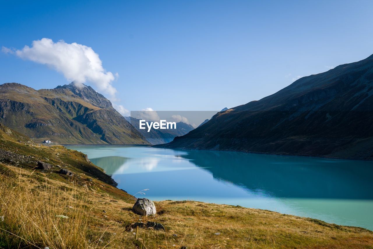 Scenic view of lake and mountains against sky silvretta 