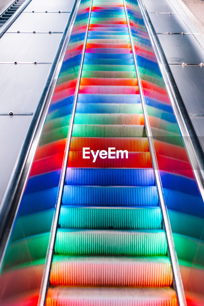 Low angle view of multi colored escalator