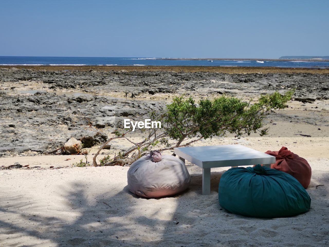 Rear view of a relaxing table on a  beach