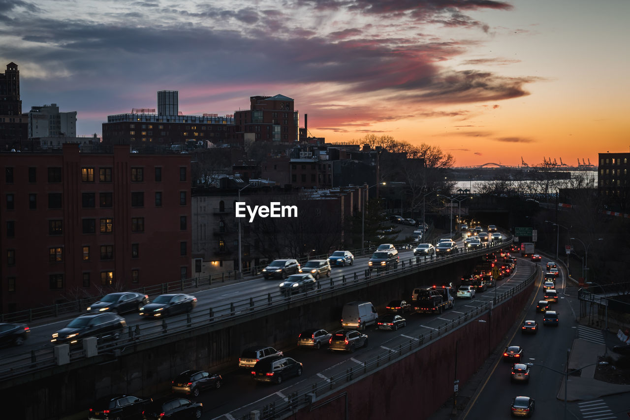 Colorful sunset on the brooklyn queens expy highway between brooklyn and manhattan in ny