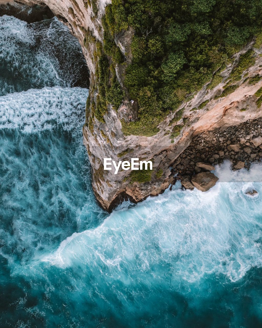 High angle view of rocks in sea