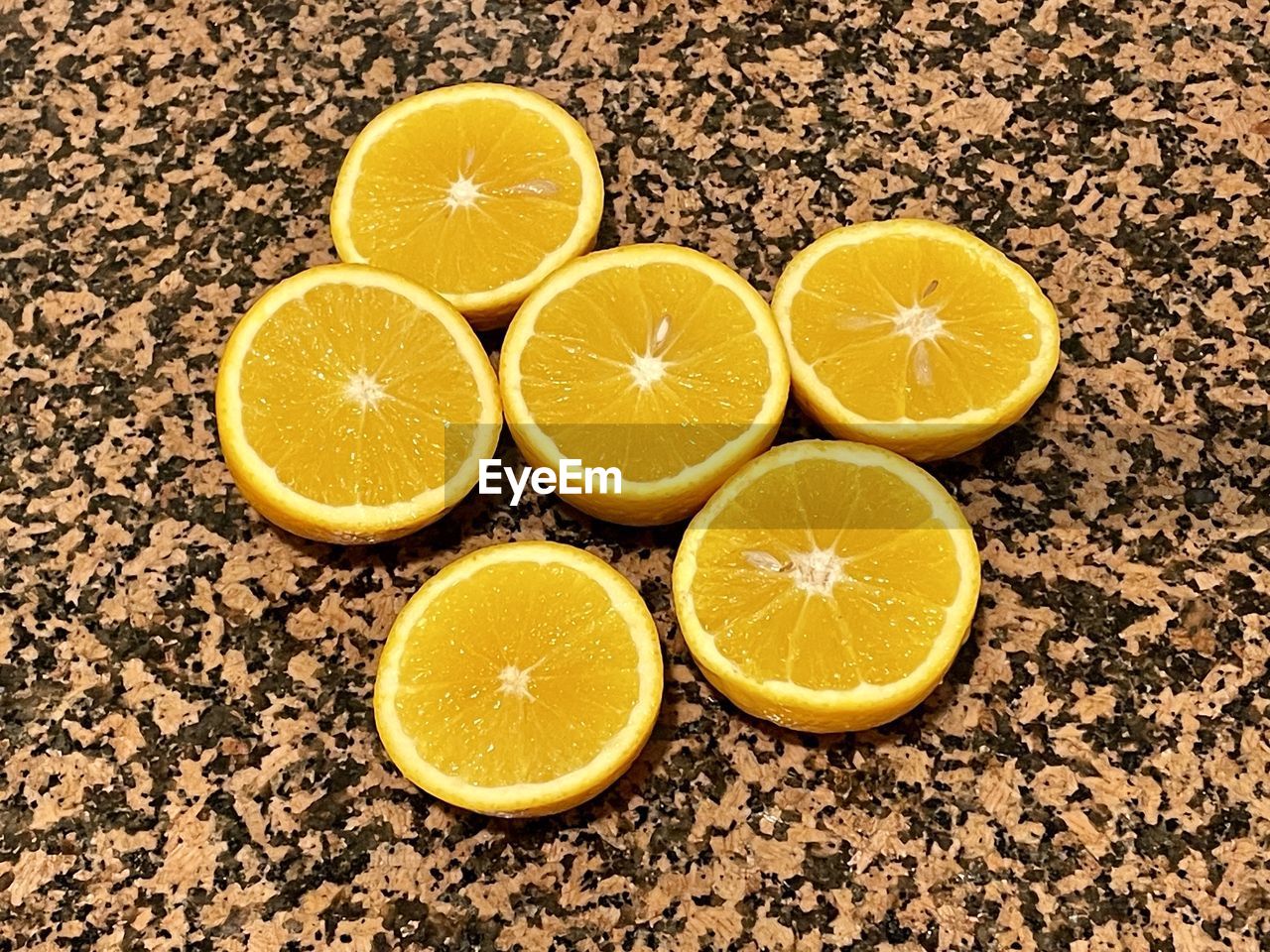 citrus fruit, fruit, food and drink, healthy eating, food, slice, wellbeing, plant, no people, freshness, lemon, orange color, produce, cross section, orange, high angle view, yellow, still life, indoors, soft drink, close-up, drink, refreshment, directly above