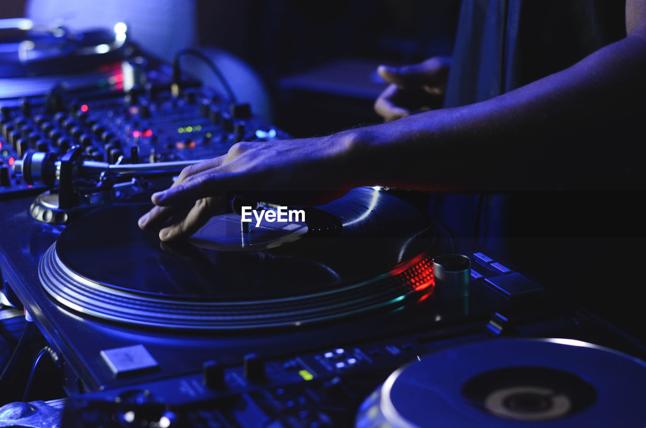 Cropped image of dj playing music during ID 112905333